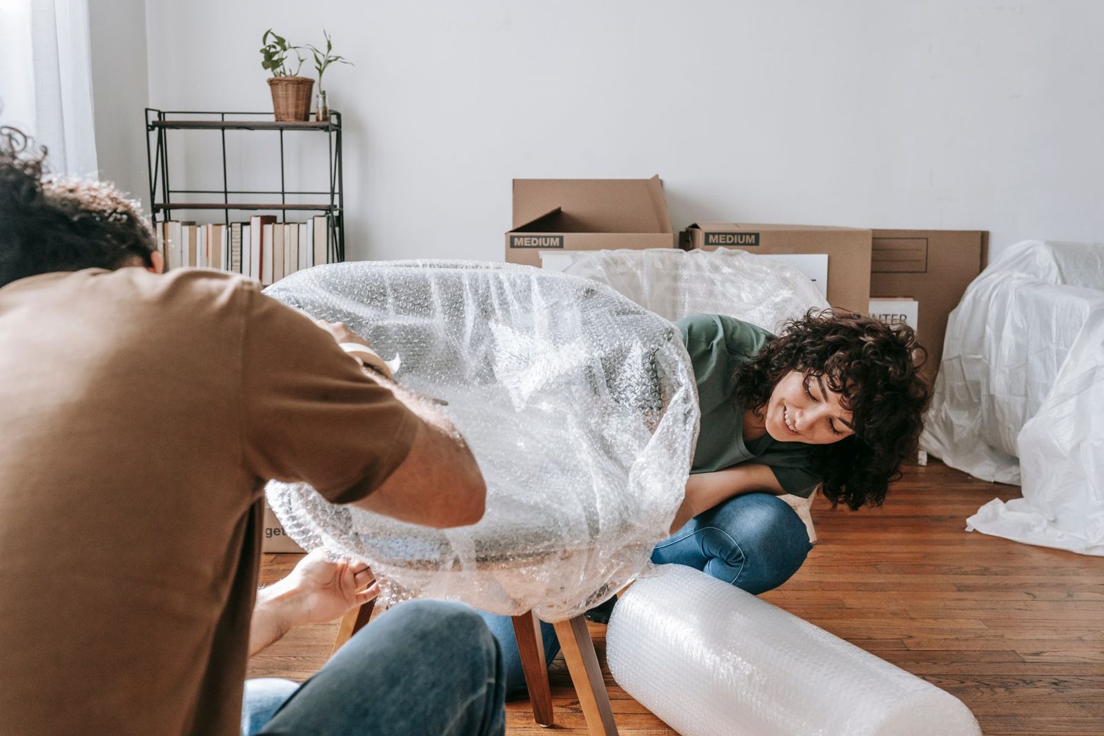 Furniture being wrapped in bubble wrap