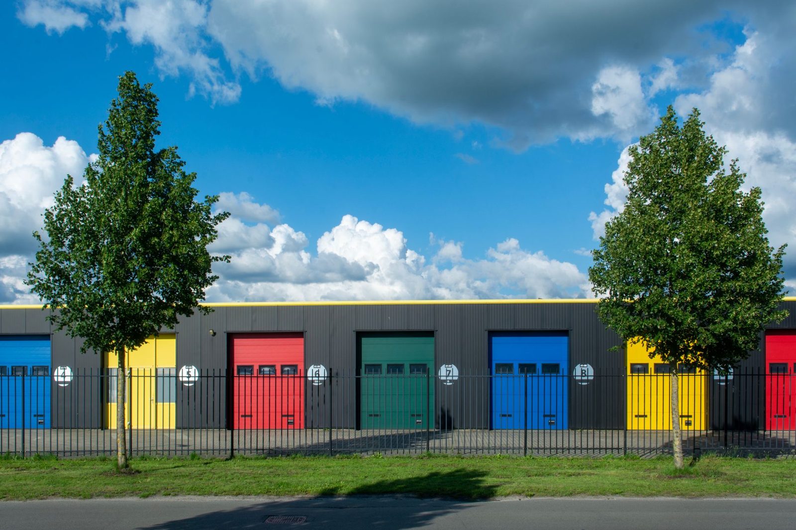 Row of colourful storage unit doors